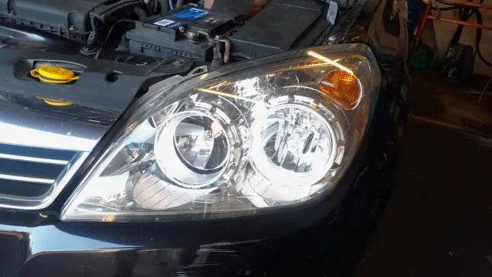 Reflektor lewy Opel Astra