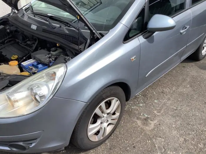 Ekran lewy przód Opel Corsa