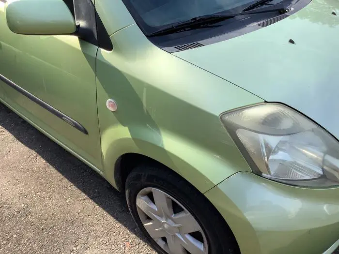 Blotnik prawy przód Daihatsu Sirion