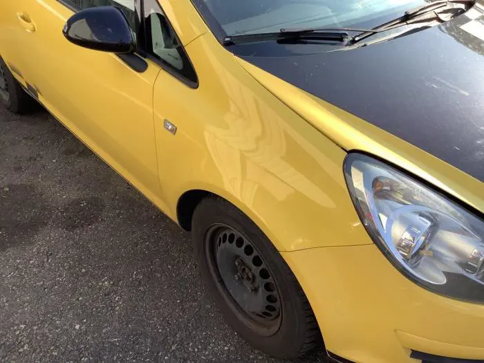 Blotnik prawy przód Opel Corsa